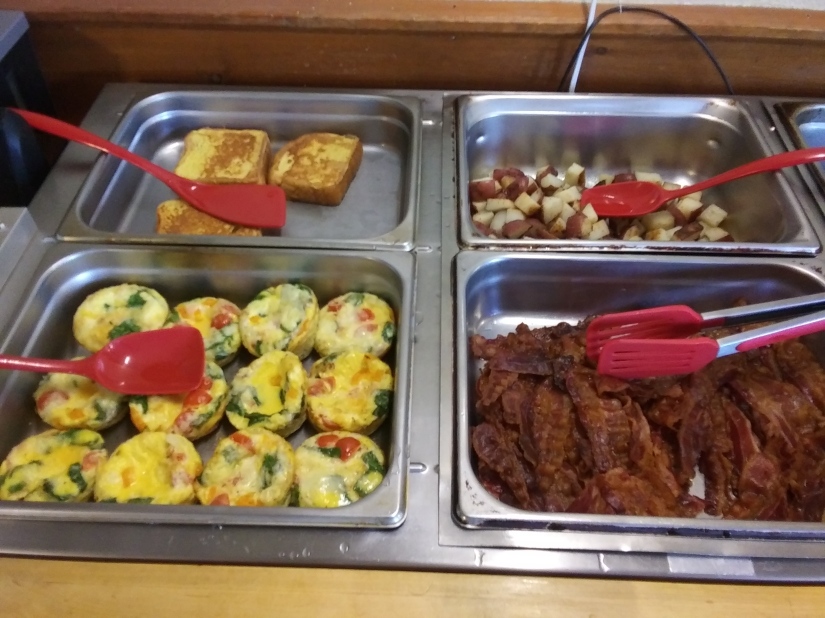 Hot breakfast buffet at Wiscasset Woods Lodge. Bacon, frittata, home fries and French toast.