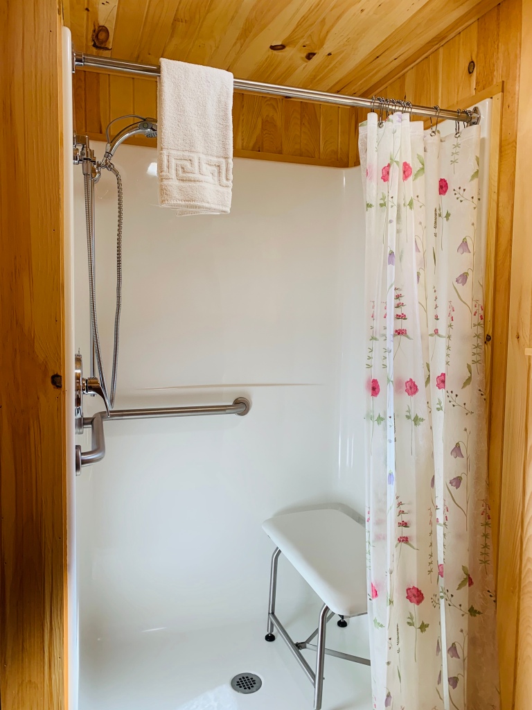 The roll-in shower in our handicap accessible room at Wiscasset Woods Lodge in Midcoast Maine.